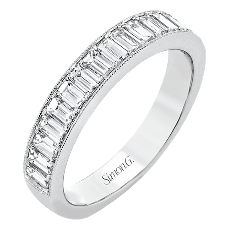 This gorgeous anniversary band is the perfect selection for those who seek a luxurious style to accompany any engagement ring, it features 1.06 cttw baguette diamonds with milgrain edges