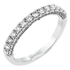 A classic, this 18K white gold diamond band features .57cttw white diamonds.
