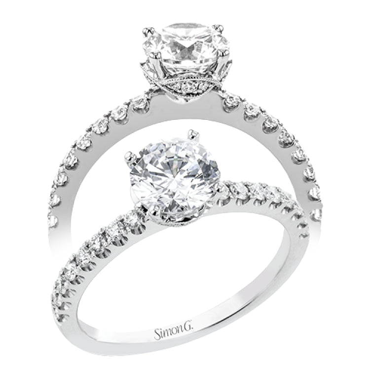 18K White Gold engagement ring featuring .29cttw diamonds. (center stone sold separately)