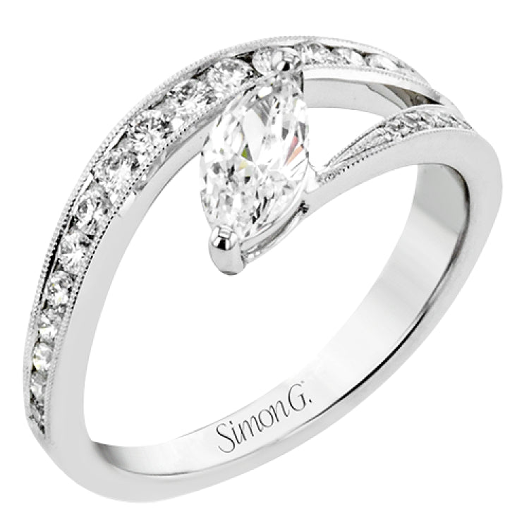 A marquise diamond set at an angle creates a contemporary look in this wonderful ring from our Lightning Collection.