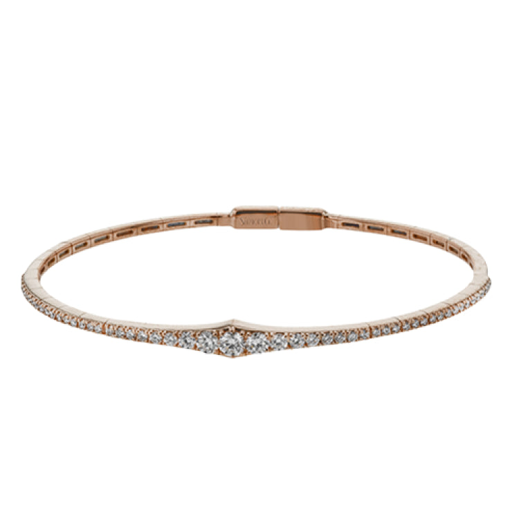 This bangle is a new take on a classic with a slightly tapered design and .88 ctw of white diamonds.