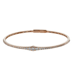This bangle is a new take on a classic with a slightly tapered design and .88 ctw of white diamonds.