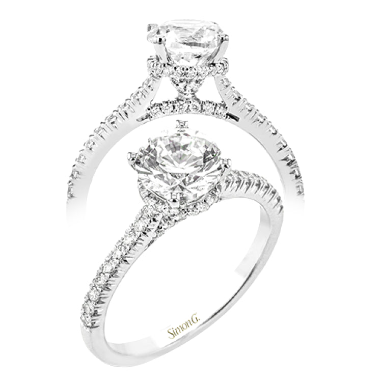 Featuring our new underhalo design, a ring of diamonds sits underneath the center stone in this bridal ring, giving a remarkable side view.