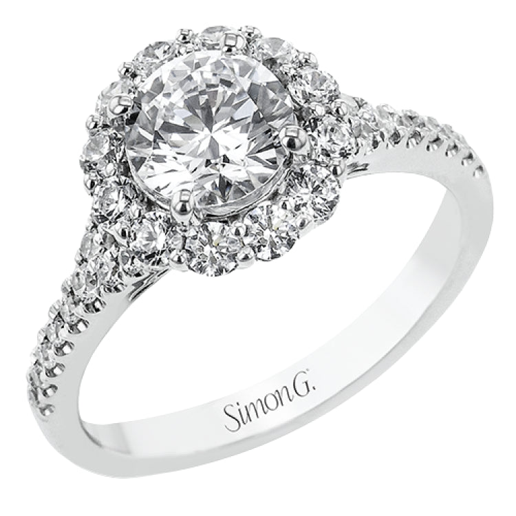 This lovely engagement ring provides an impressive amount of sparkle with .73 ctw in a halo design.