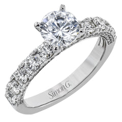 This engagement ring is sure to shine, with a classic straight design set with .75 ctw of white side diamonds.