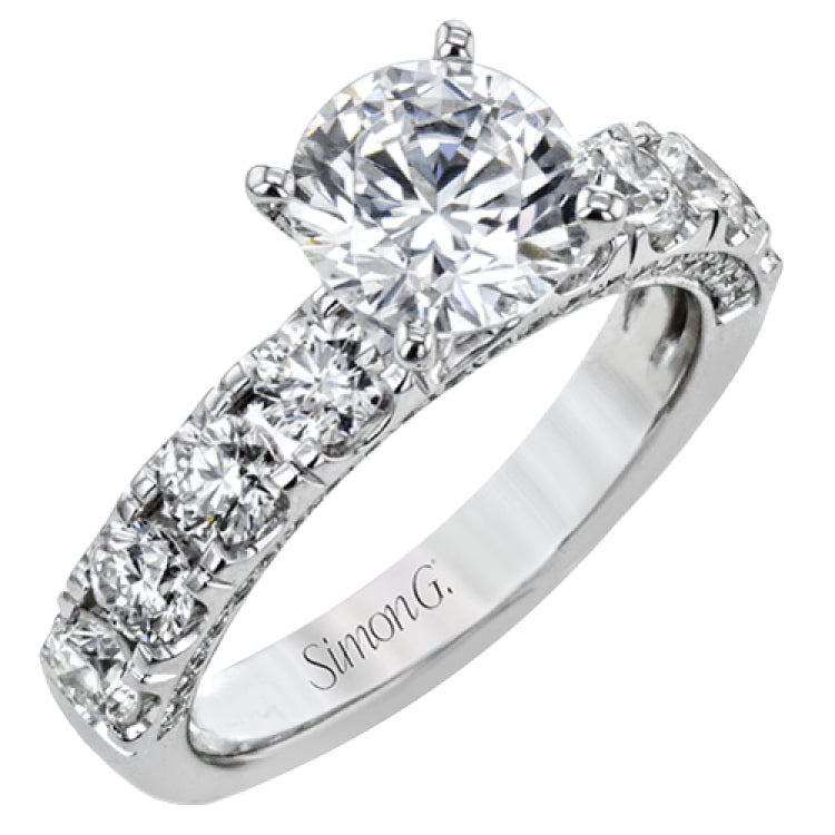 This engagement ring makes a statement with 1.39 ctw of side diamonds that shine from the top ad sides of the ring.
