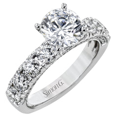 This engagement ring makes a statement with 1.39 ctw of side diamonds that shine from the top ad sides of the ring.