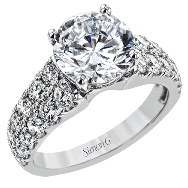 This bold engagement ring contains 1.50 ctw of side diamonds and will be sure to draw anyone's eyes with its modern design.