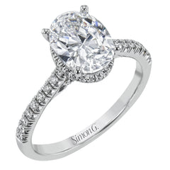 This 18k white gold engagement ring is perfect for an oval center stone, accented by .32 ctw of white diamonds.