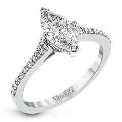 Simple yet stunning, this graceful engagement ring is made for a marquise cut center stone and is set with .16 ctw of white diamonds.