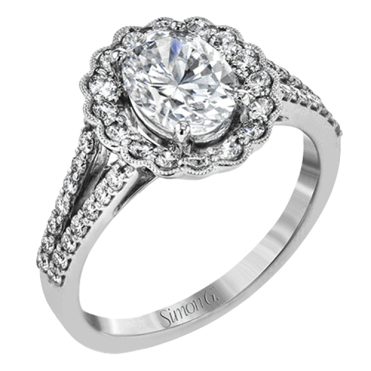This delightful engagement ring features a scalloped halo that surrounds the center stone like a flower, containing .52 ctw of white diamonds.