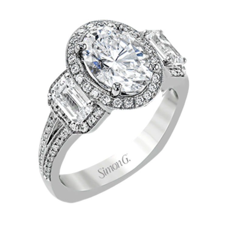 This impressive white gold ring features .43 ctw emerald cut side diamonds and is accented with .38 ctw round cut diamonds.