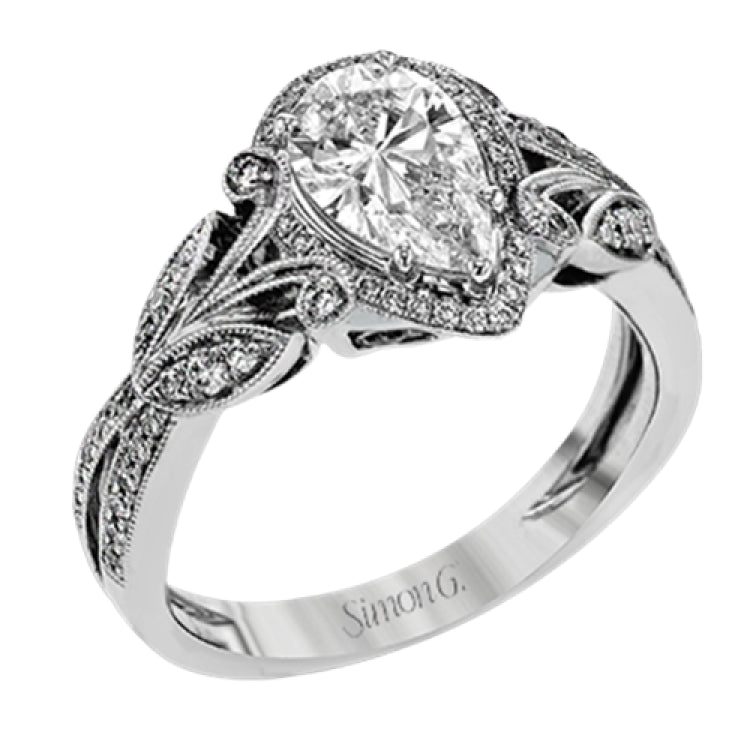 This amazing 18k white gold engagement ring features vintage-inspired design elements set with .28 ctw of white diamonds.