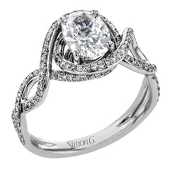 Classic with a modern twist, this white gold engagement ring features .50 ctw of sparkling white diamonds in a dramatic openwork design.