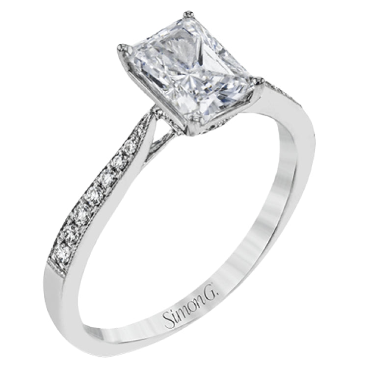 The delicate, understated design of this lovely white gold ring is elevated by .27 ctw of round white diamond accents.