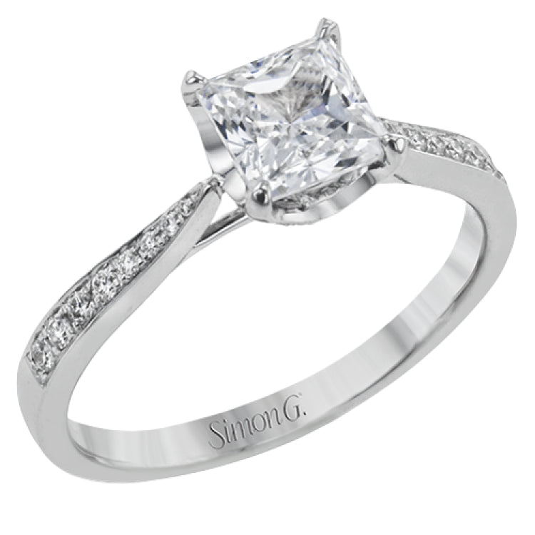 The delicate, understated design of this lovely white gold ring is elevated by .27 ctw of round white diamond accents.