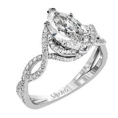 Classic with a modern twist, this white gold engagement ring features .50 ctw of sparkling white diamonds in a dramatic openwork design.