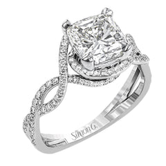 Classic with a modern twist, this white gold engagement ring features .50 ctw of sparkling white diamonds in a dramatic openwork design.