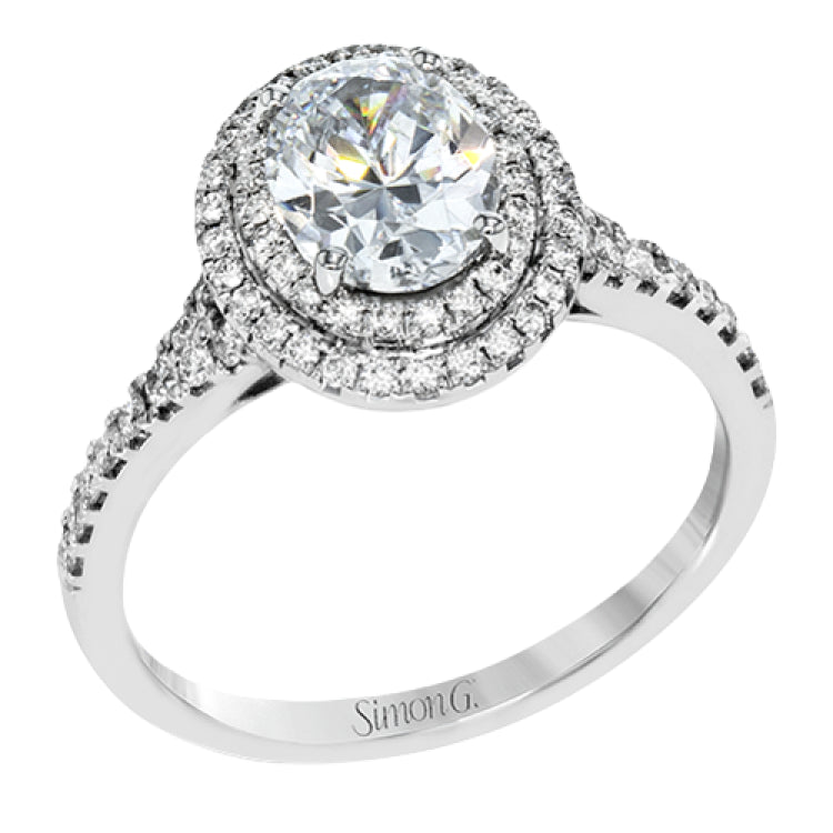 This beautiful, classic style setting features a double halo design built for an oval center stone. It contains .40 ctw of side diamonds.