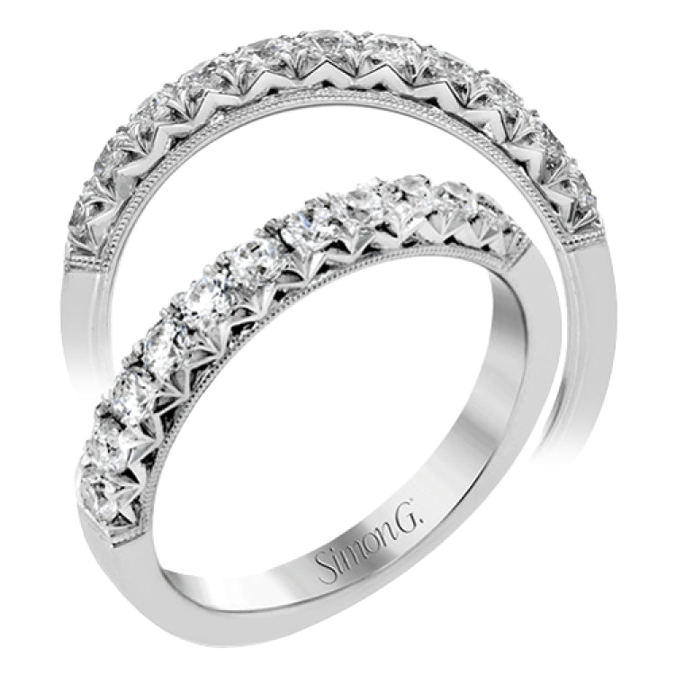 This classic wedding band features a distinctive setting style that shows off the .50 ctw of white diamonds to their full advantage.