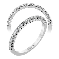 This classic wedding band contains a stunning .35 ctw of white round diamonds