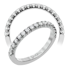 This classic wedding band features a distinctive setting style that shows off the .35 ctw of white diamonds to their full advantage.