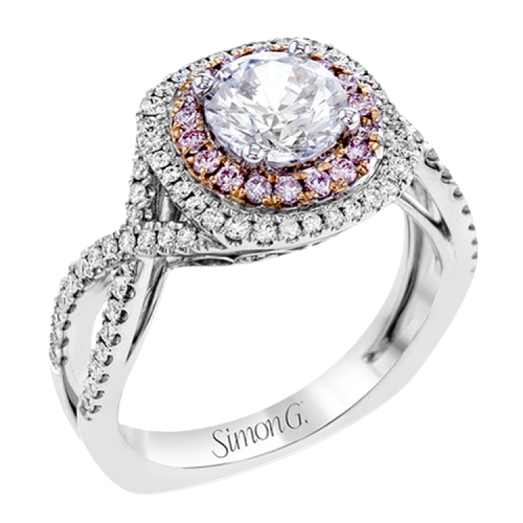 This lovely halo engagement ring is crafted in tones of 18k rose and white gold and contains .36 ctw of white diamonds along with .18 ctw of pink diamonds.