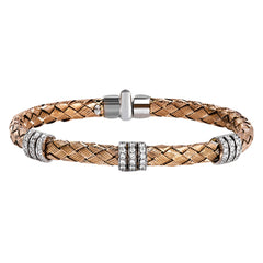 Carefully woven from 18k rose gold, this remarkable bangle bracelet is perfect for everyday wear as well as formal occasions with .72 ctw of white diamonds. Perfect for stacking.