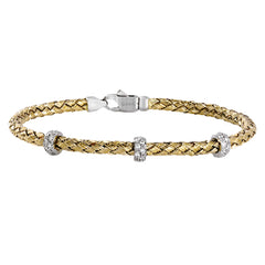 This wonderful 18k yellow gold woven bracelet contains .33 ctw of white diamonds, adding an opulent touch which can still be worn everyday. Perfect for stacking.