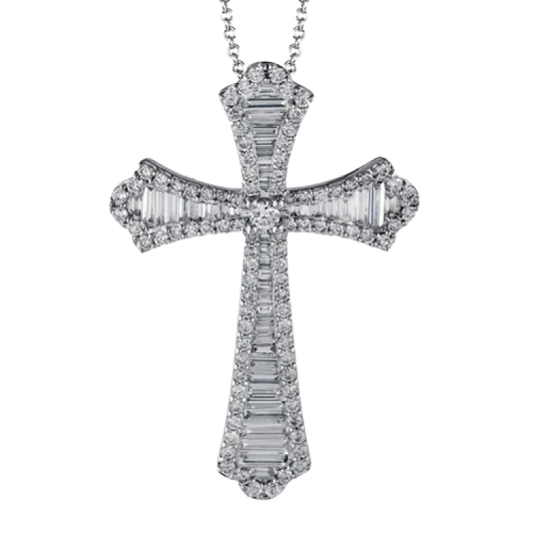 This striking white gold cross pendant is accented by the presence of .40 ctw round white diamonds and .56 ctw baguette cut diamonds.