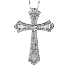 This striking white gold cross pendant is accented by the presence of .40 ctw round white diamonds and .56 ctw baguette cut diamonds.