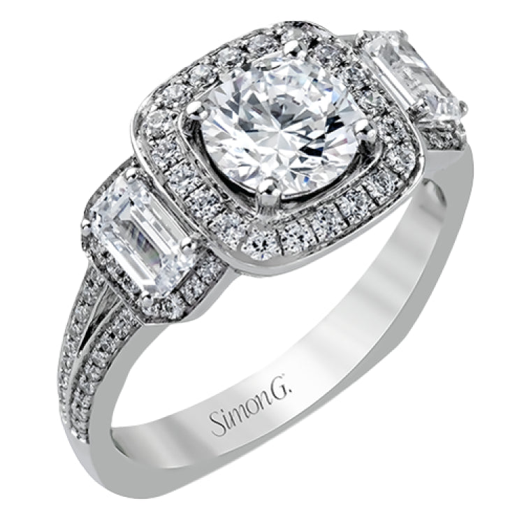 This impressive white gold ring features .43 ctw emerald cut side diamonds and is accented with .38 ctw round cut diamonds.