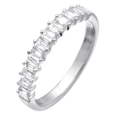 This 18K white gold band features .80cttw white baguette diamonds.
