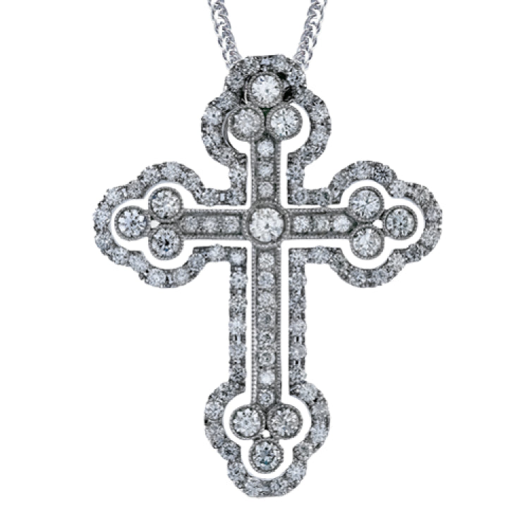 Set with a shimmering center diamond, this Gothic style cross pendant features 1.43 ctw of sparkling white diamonds through its stunning design.