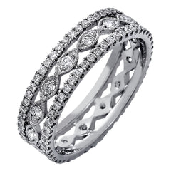 This wonderful 18k gold band features .87 ctw of white diamonds set into an intricate, three layer design.  It can be worn on its own as a fashion statement or function as a wedding band.