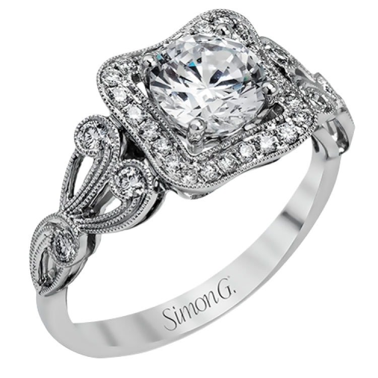 The lovely vintage design of this impressive white gold ring is emphasized by .27 ctw sparkling round cut white diamonds.