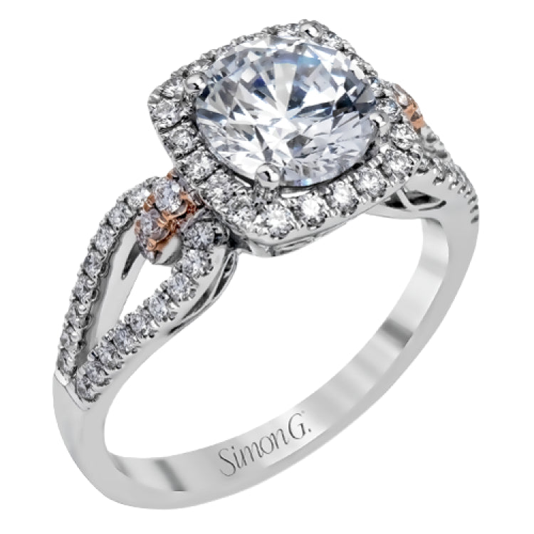The delicate romantic design of this vintage inspired white and rose gold engagement ring and wedding band set is accentuated by .45 ctw of white diamonds and .08 ctw of pink diamonds.