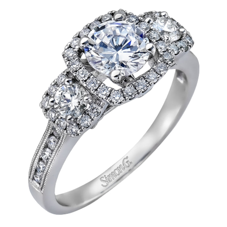 This dramatic contemporary white gold ring is accentuated by .37 ctw round cut white diamonds and features .30 ctw glimmering side stones.