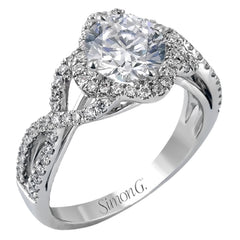 Set with .35 ctw of arresting round cut white diamonds, this lovely white gold engagement ring features a memorable intertwined design on the band.