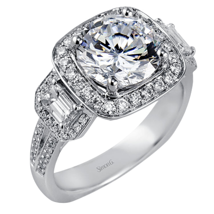 Featuring an impressive modern design, this white gold ring features .53 ctw emerald cut stone sides and .46 ctw round cut white diamonds.